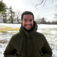 Jason Ludwig standing in a snow-covered field. 
